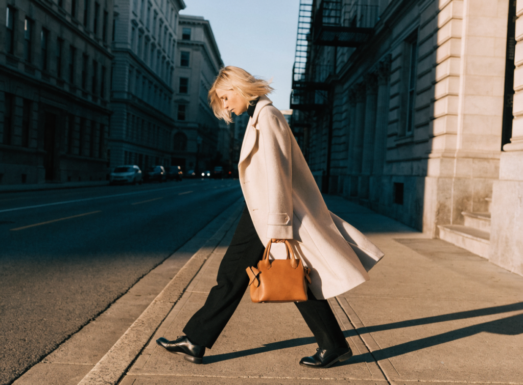 Woman walking with presence on a city street